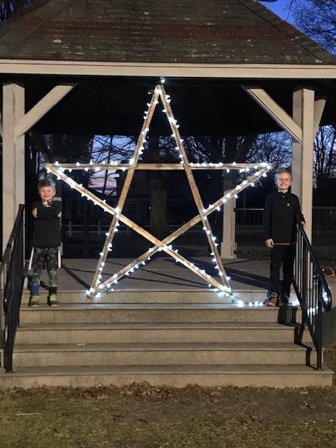 Joey and Jaxx help light the town park with a Star of Hope. Nice job boys!